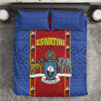 Top view blue bedding set with central red shield design and two matching pillowcases