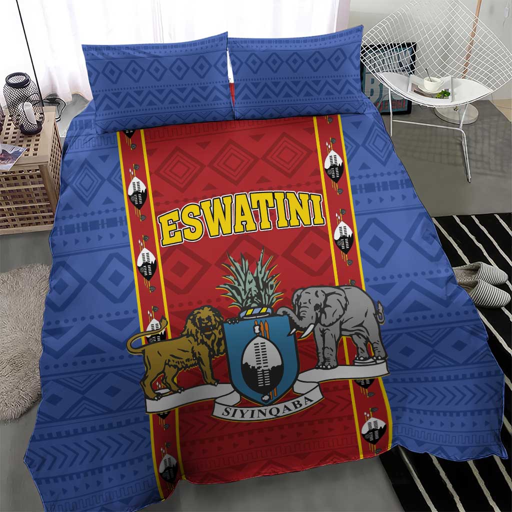 Blue bedding set featuring central shield artwork with lion, elephant, and two pillowcases