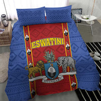 Blue bedding set featuring central shield artwork with lion, elephant, and two pillowcases