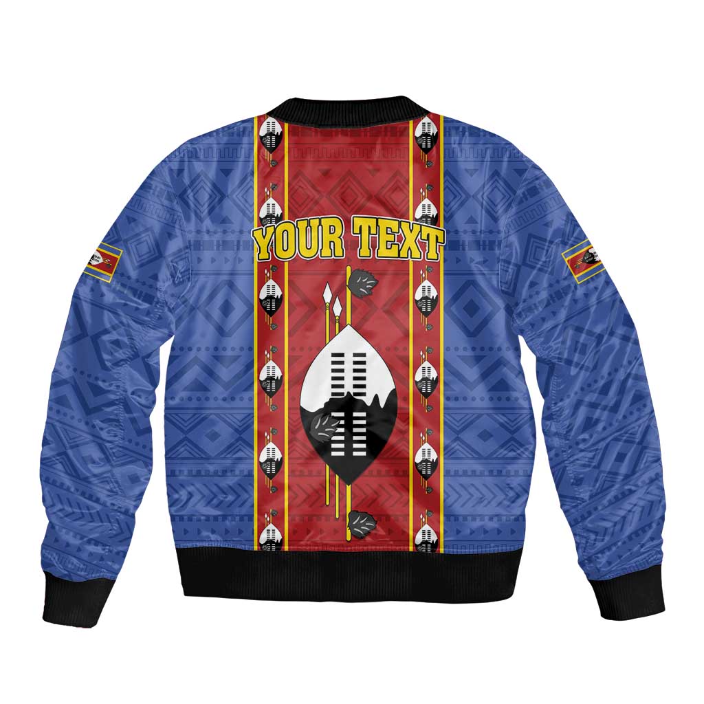 Blue bomber jacket with zip front, black cuffs, and red YOUR TEXT graphic panel