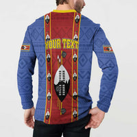 Blue button sweatshirt with yellow collar, red back panel, YOUR TEXT and shield graphic