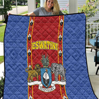 Blue quilt blanket with red shield center panel showing ESWATINI text and animals, folded