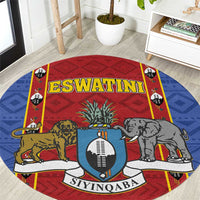 Round African pattern carpet rug with red-and-blue shield design, lion and elephant animal graphics
