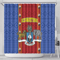 Blue and red shower curtain featuring a central crest shield with lions, elephant, and plants