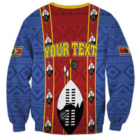 Blue African pattern sweatshirt with shield graphic and bold yellow-outlined text