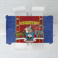 Blue and red African pattern tablecloth with shield crest and animal motifs