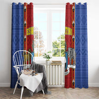 Pair of blue and red African pattern window curtains with shield emblem and animal art