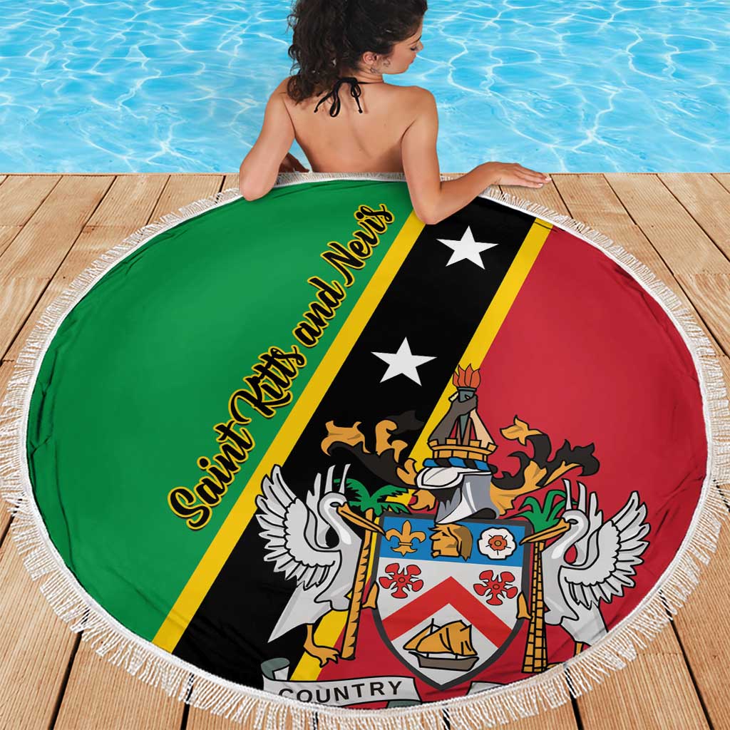 Green round beach blanket with Saint Kitts and Nevis crest and black-red diagonal stripe, fringed border