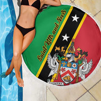 Green round beach blanket with Saint Kitts and Nevis crest, black and red diagonal stripe, fringed edge