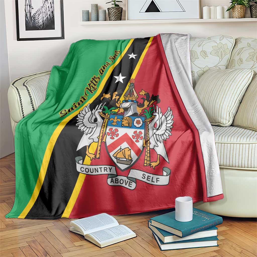 Folded Saint Kitts and Nevis blanket in green, black, and red with crest and star accents