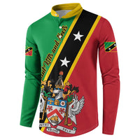 Green and red button sweatshirt with yellow diagonal band, star emblem, and coat-of-arms crest.