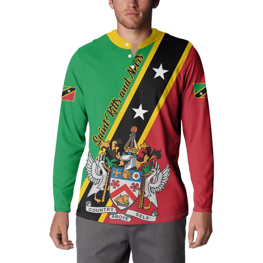 Green, red and black button sweatshirt with yellow-trim diagonal panel and crest graphic.
