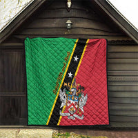 Green and red quilt blanket on porch steps with black star stripe and crest emblem