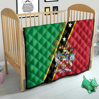 Green and red quilt blanket with diagonal black stripe, stars, and crest emblem