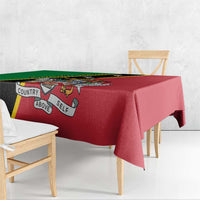 Red tablecloth with green border and black banner, “Country Above Self” graphic