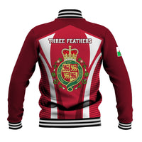 Red rugby baseball jacket with back crest, three feathers text, and striped panels