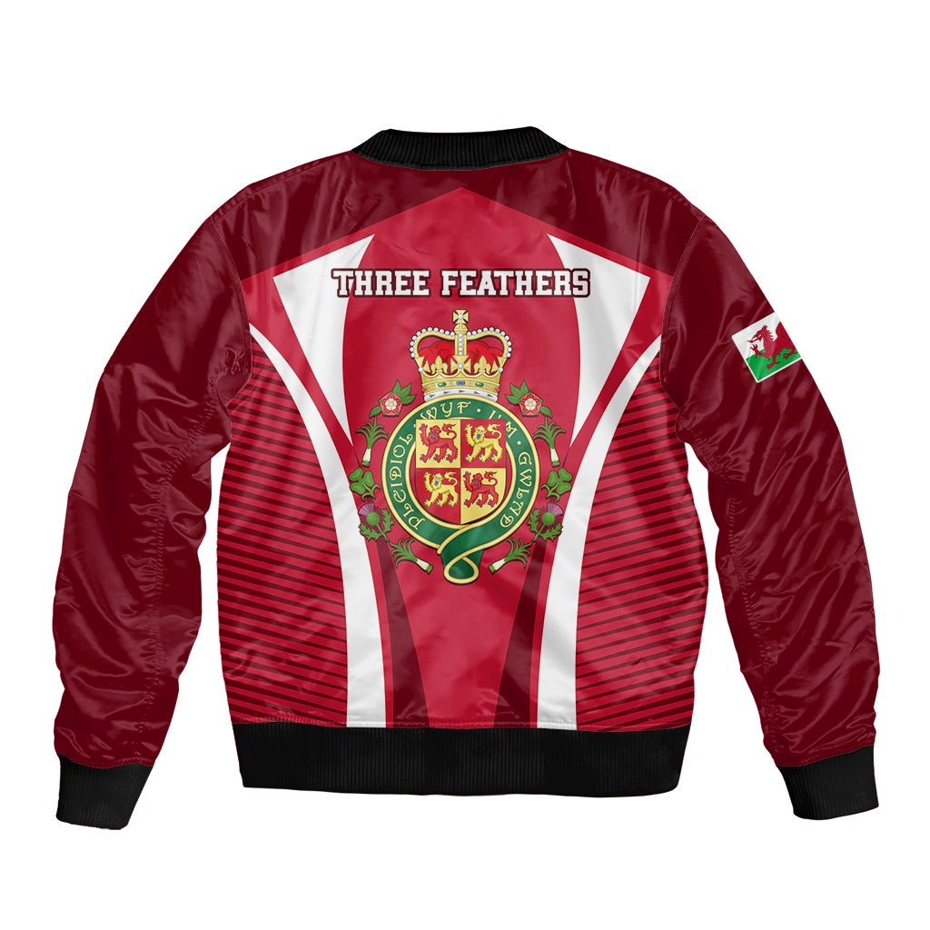 Red bomber jacket with black collar trim, back 'THREE FEATHERS' and Wales crest, striped panels