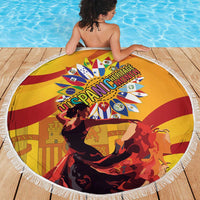 Round beach blanket with white fringe, yellow/red Spanish Heritage graphic on wooden deck