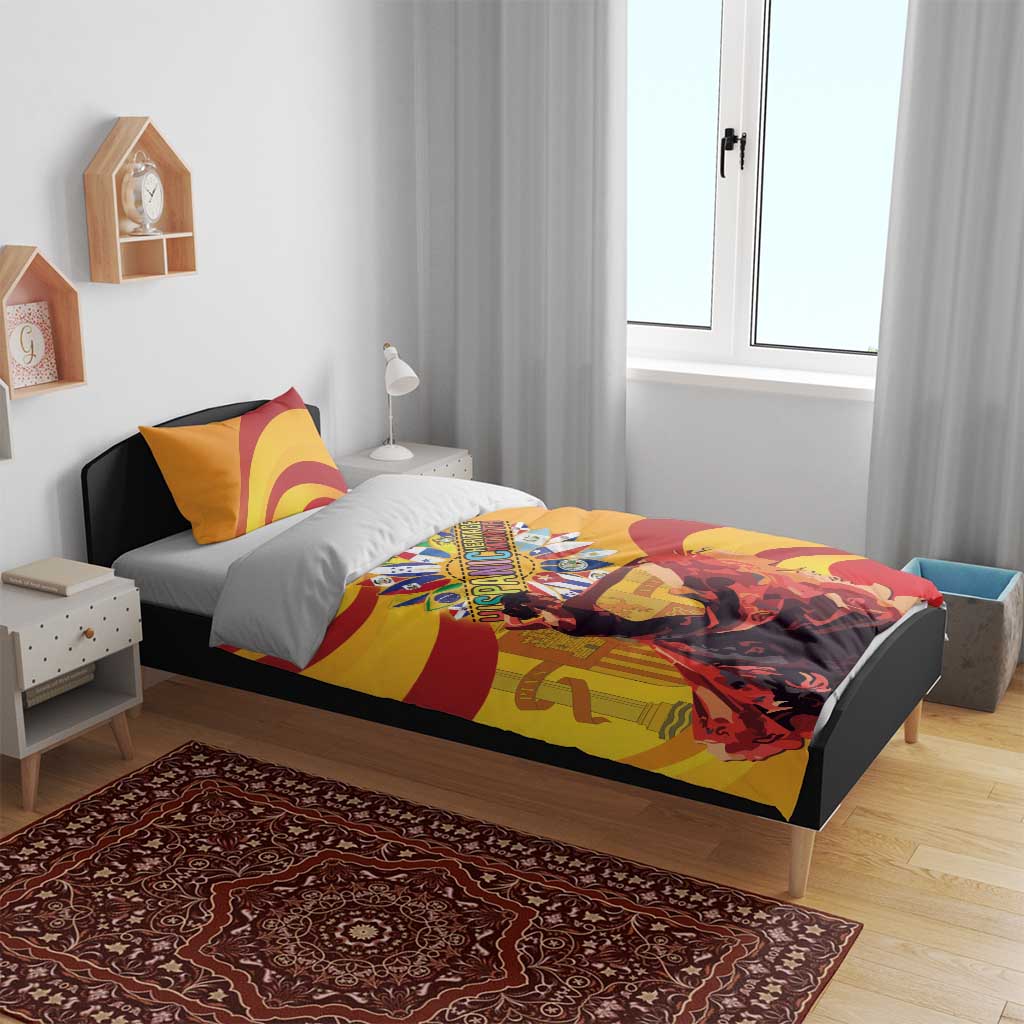 Yellow duvet cover and pillow shams with red wave stripes and Hispanic Heritage Month emblem featuring flamenco dancers