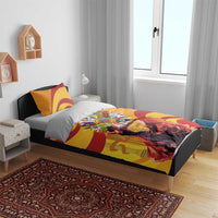 Yellow duvet cover and pillow shams with red wave stripes and Hispanic Heritage Month emblem featuring flamenco dancers