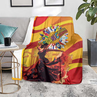 Yellow and red flamenco portrait throw blanket on a chair with sunburst-style emblem.