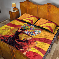 Yellow quilt bed set with red diagonal stripes, colorful Hispanic Heritage Month emblem, two shams.