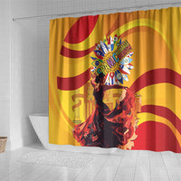 Yellow shower curtain with red curved stripes and large center heritage emblem over dancer artwork
