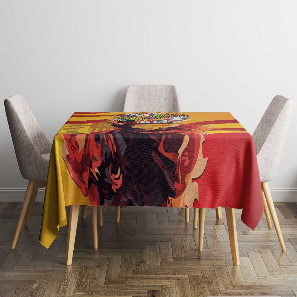 Square tablecloth with yellow and red bold pattern and central illustrated figure