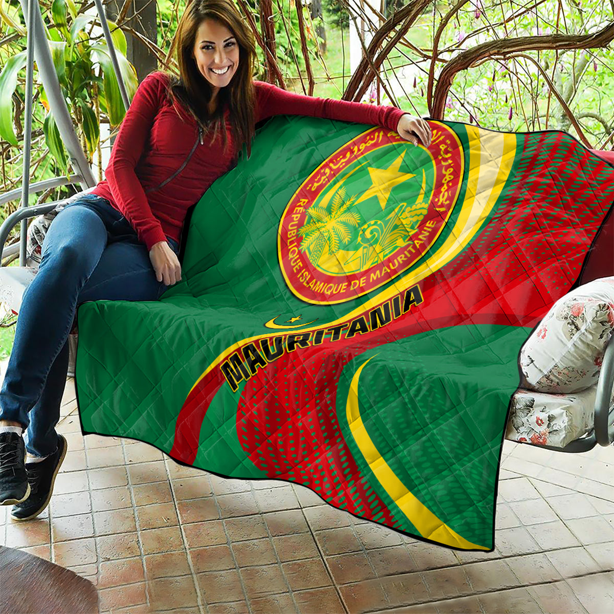 Mauritania quilt blanket draped on outdoor lounge chair with central seal and banner text