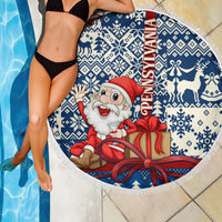Round blue and white Santa with gift graphic beach blanket with fringe edge.