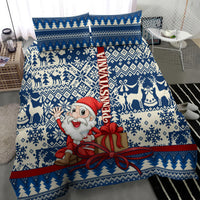 Blue Christmas duvet set with Santa and gift bow, reindeer, snowflake, and tree icons