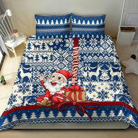 Blue Christmas bedding set featuring Santa with gift bow and snowy trees, reindeer motifs