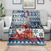 Blue Santa Christmas blanket with red bow gift ribbon, diamond snowflake and tree pattern