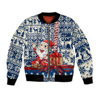 Blue bomber jacket with Santa Claus graphic, gift box, and black ribbed cuffs