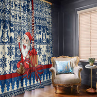Blue Santa Christmas curtain panel pair with bows and geometric snowflake pattern