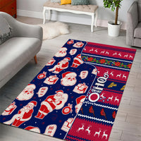 Blue Christmas area rug with Santa and gift icons plus red holiday stripe border