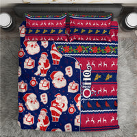 Blue Christmas bedding set with Santa, gifts, reindeer, and holiday stripe pattern