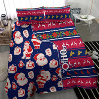 Blue Christmas bedding set with Santa and gift motifs, reindeer, and festive stripes