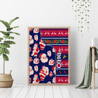 Framed blue Santa holiday canvas wall art with red and white figures and reindeer