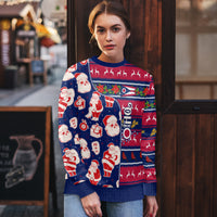 Blue Christmas sweater on model, Santa and striped knit pattern with OHIO graphic
