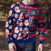 Blue Santa-themed ugly Christmas sweater with multicolor knit pattern, ribbed cuffs and hem
