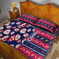 Blue and red Christmas quilt bed set with Santa, ornaments, and zigzag holiday pattern