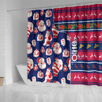 Blue holiday shower curtain with Santa and gift pattern; red striped side panel.