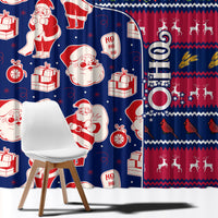 Close view of blue and red holiday curtain with Santa faces, gifts, and stars