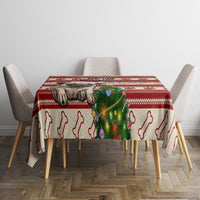 Red Christmas tablecloth with pug dog, dog bones, and glowing Christmas tree design