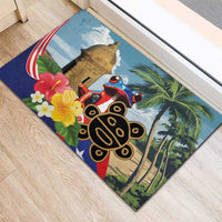 Colorful rubber doormat with coqui frog, El Morro fort, and tropical flowers