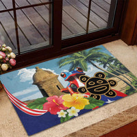 Colorful rubber doormat with tropical palm scene, coqui frog, and red-white hammock