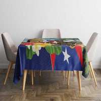 Colorful tablecloth on dining table with Puerto Rican flag star and tropical design