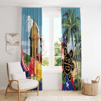 Blue curtain panels with coqui frog and Morro tower near window