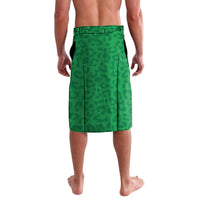 Green camo-pattern lavalava skirt with dark trim, no front graphic shown (back view)